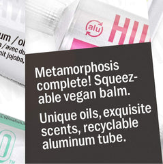 Hurraw! Balmtoo squeezable tube shown for convenient on-the-go body and lip care.
