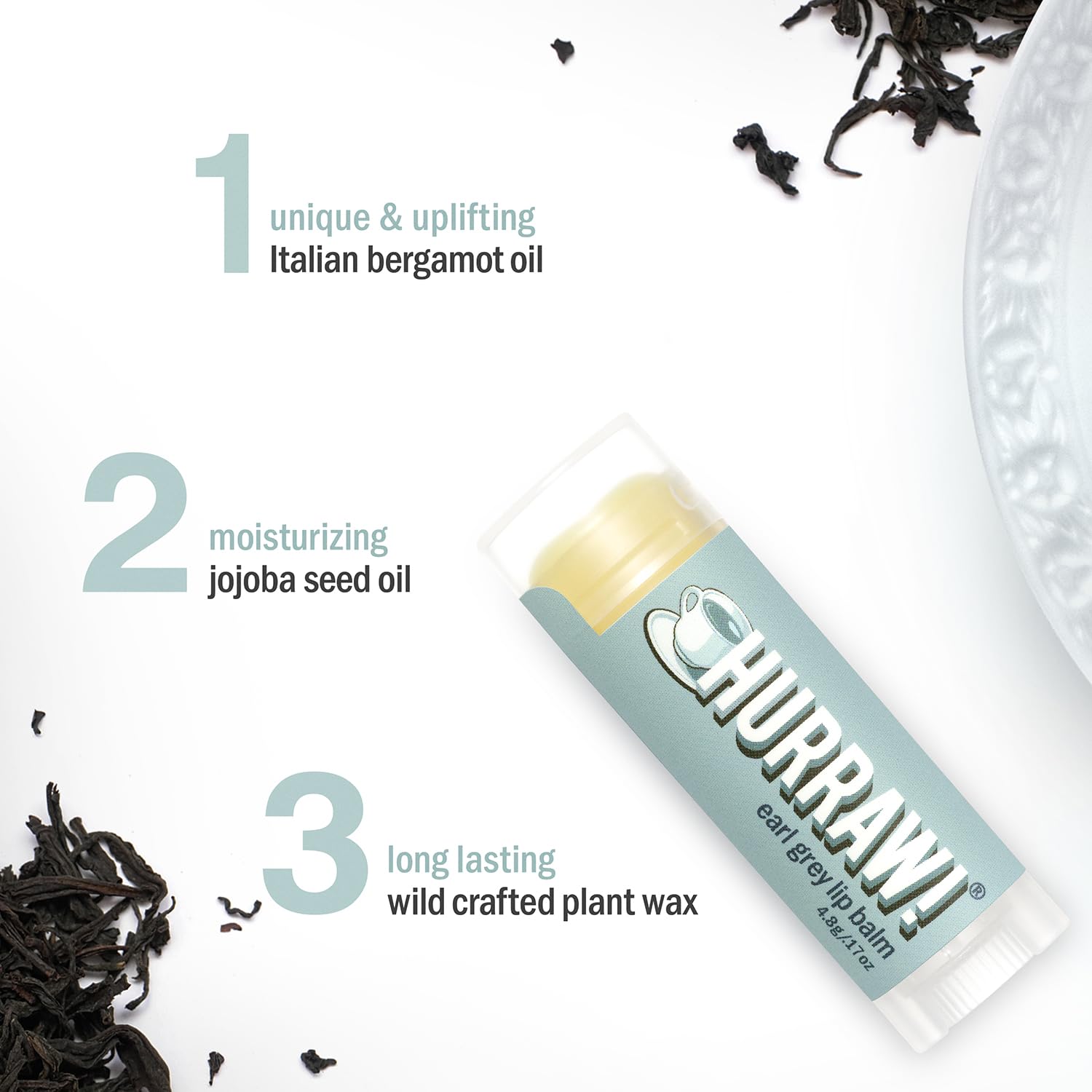 HURRAW Earl Grey lip balm packaging flatlay with vegan credentials displayed