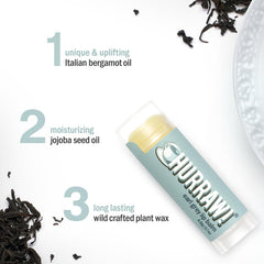 HURRAW Earl Grey lip balm packaging flatlay with vegan credentials displayed