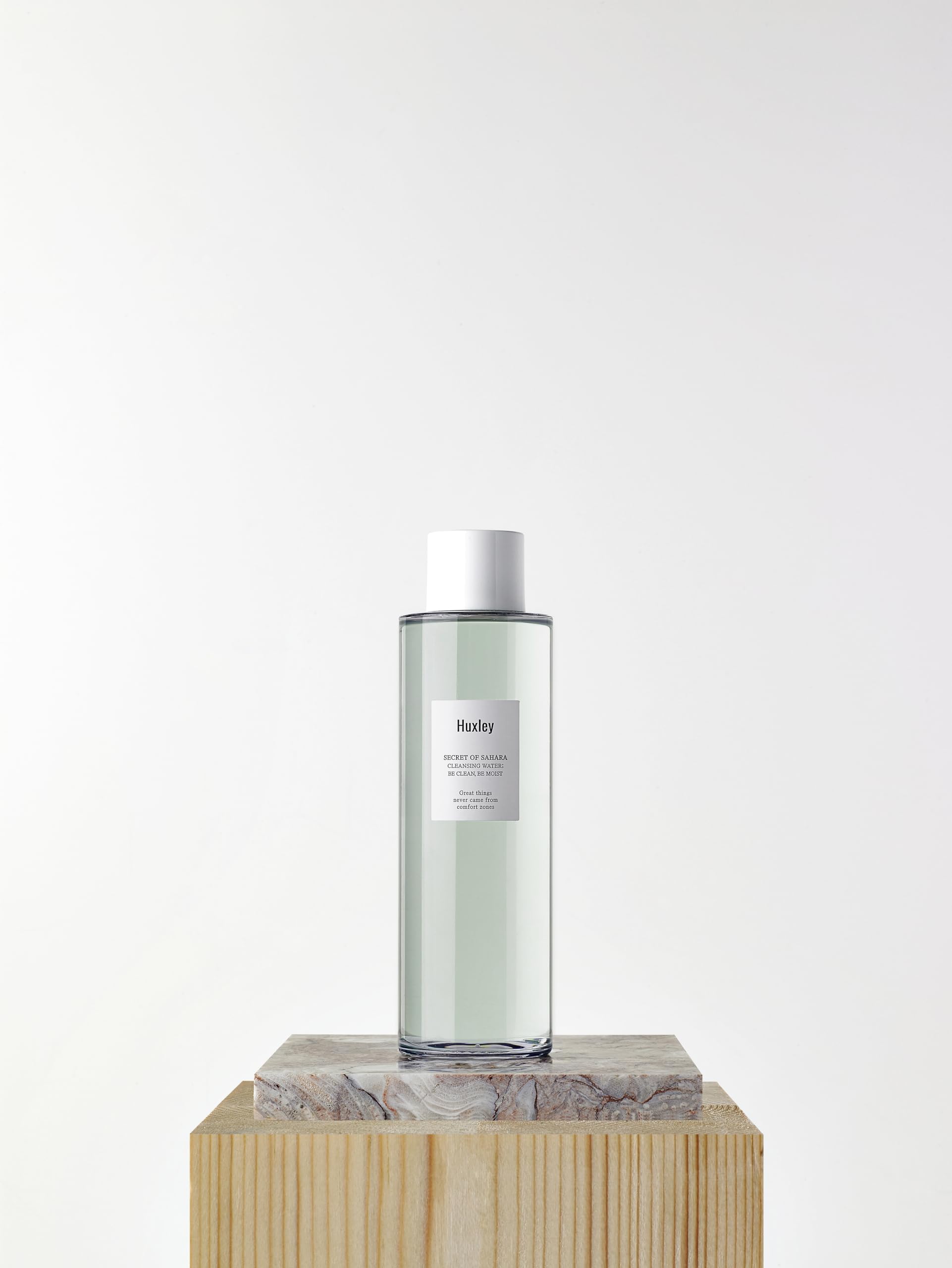 Huxley cleansing water on cotton pads for easy first cleanse