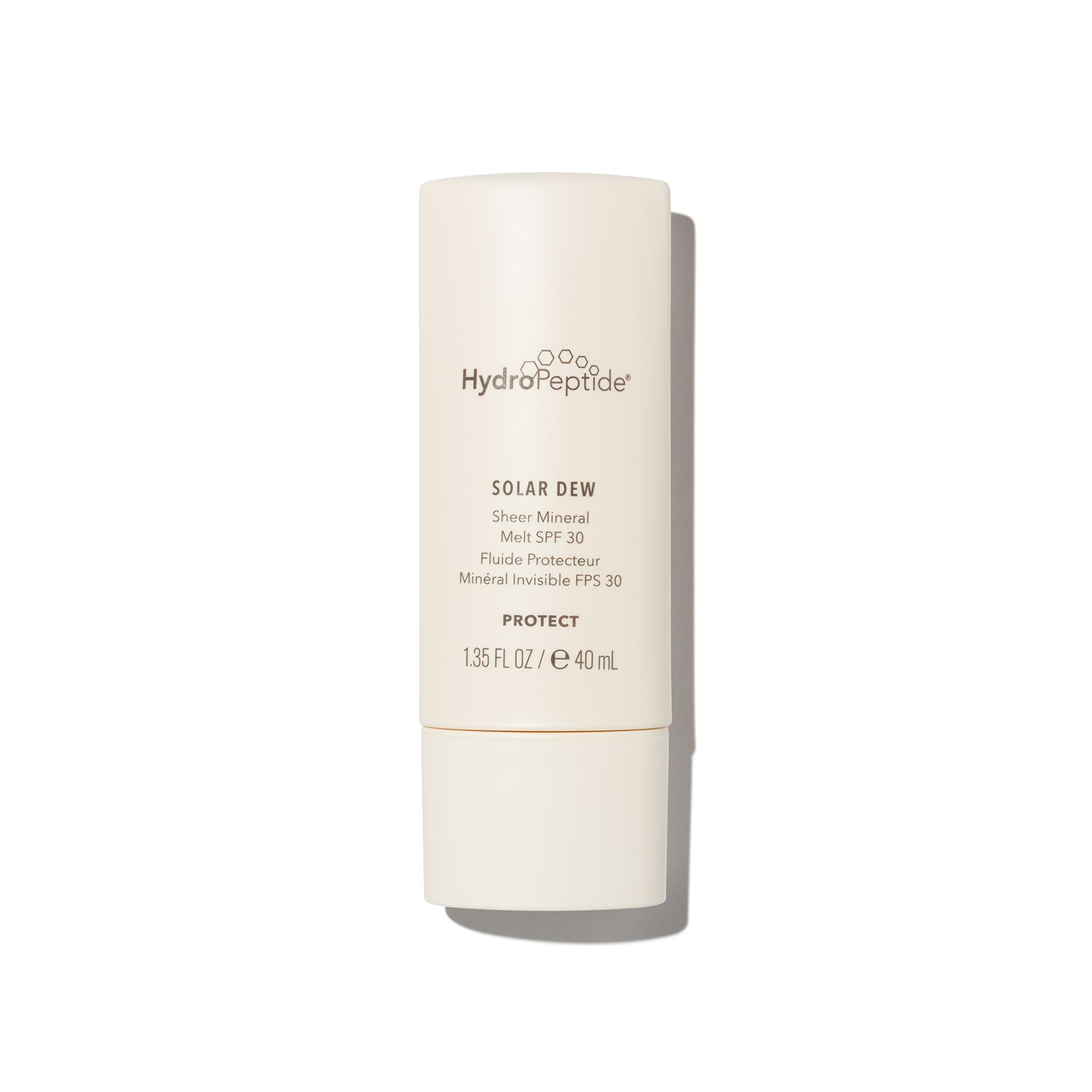 HydroPeptide Solar Dew Mineral Melt bottle on desk showing weightless mineral SPF protection