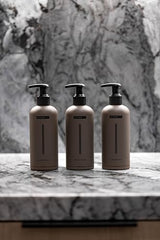 HygieneLab men's natural body wash bottle with dispensing cap for easy use.