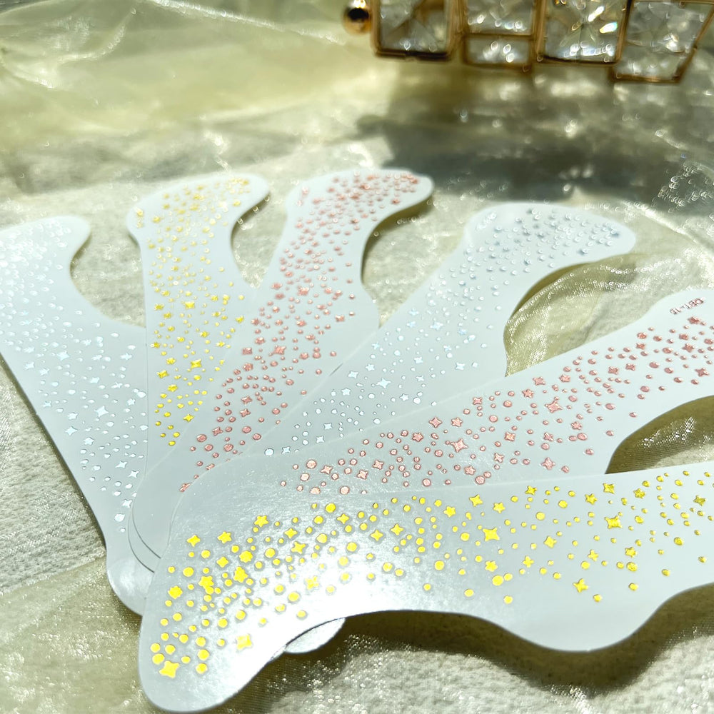 Hymik Mini gold glitter patches add tiny sparkles to daily or party makeup.