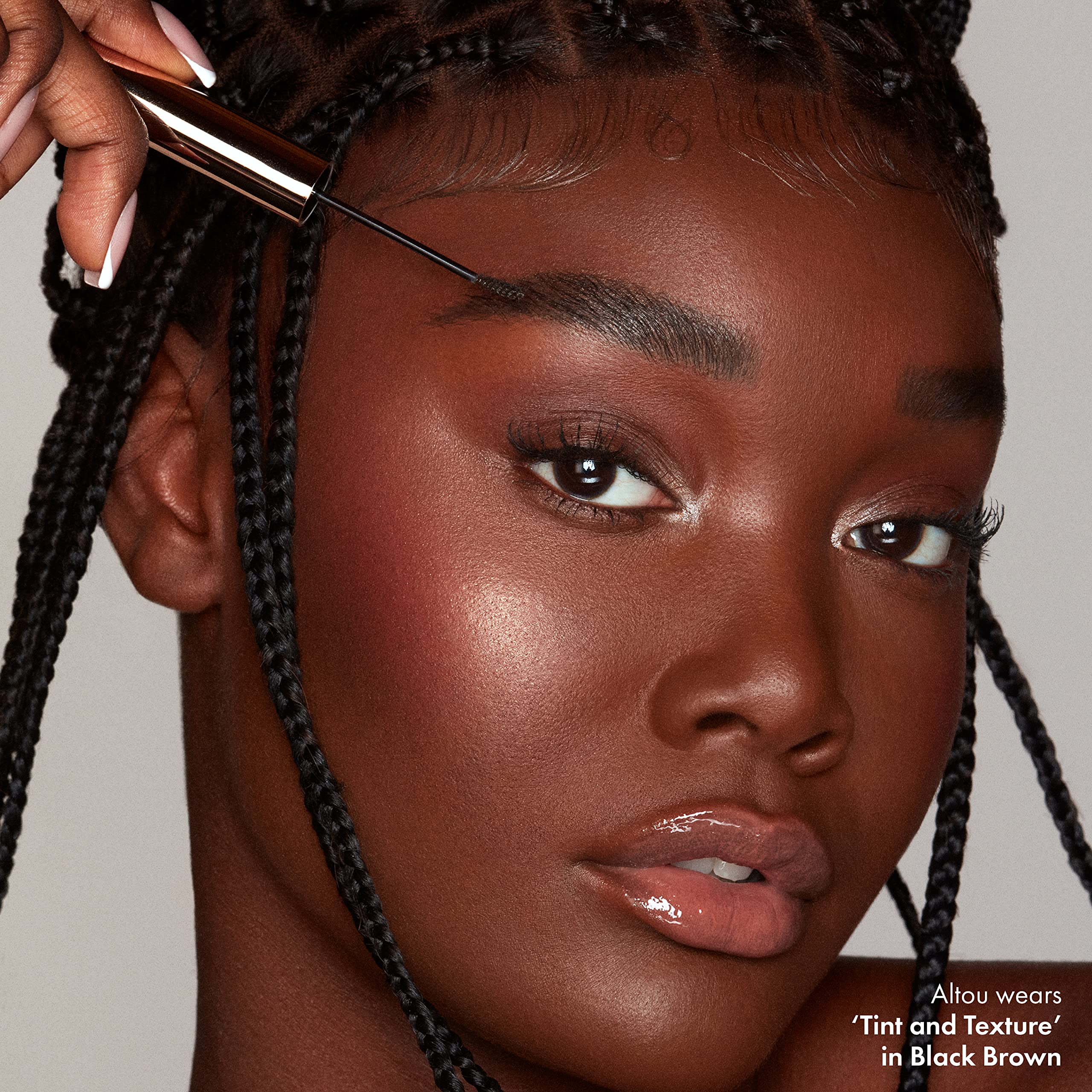 ICONIC LONDON Brow Tint and Texture petite applicator in action for controlled application.