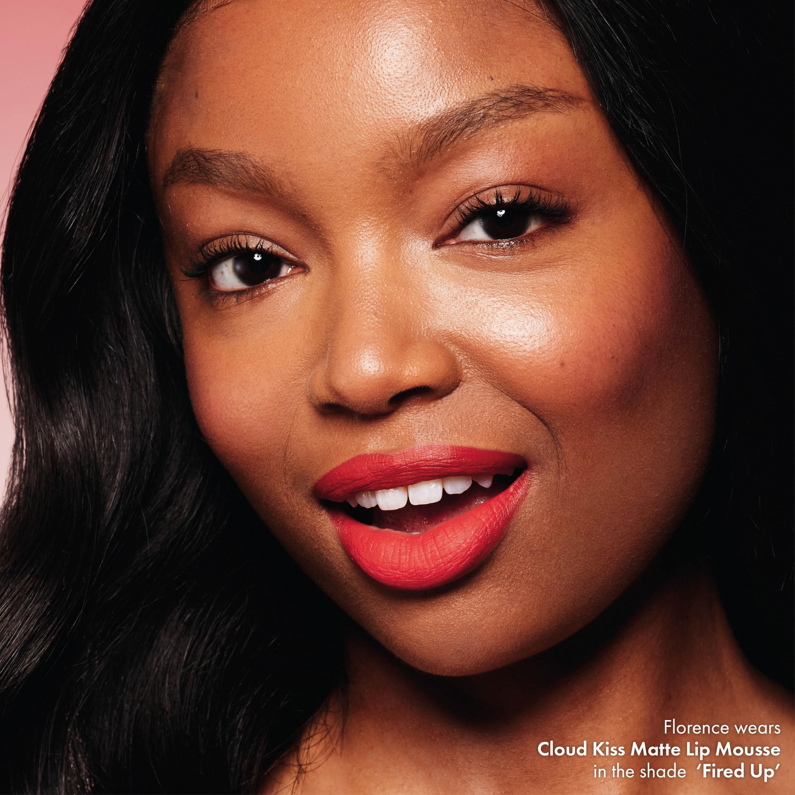 ICONIC LONDON Cloud Kiss texture reveals satin-matte creaminess on lips.