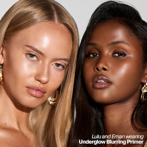 Iconic London Underglow Primer swatch on skin showing natural glow and even texture.