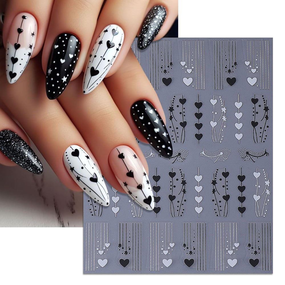Close-up of IDDFEVE heart-line decals on a nail for a sleek look.