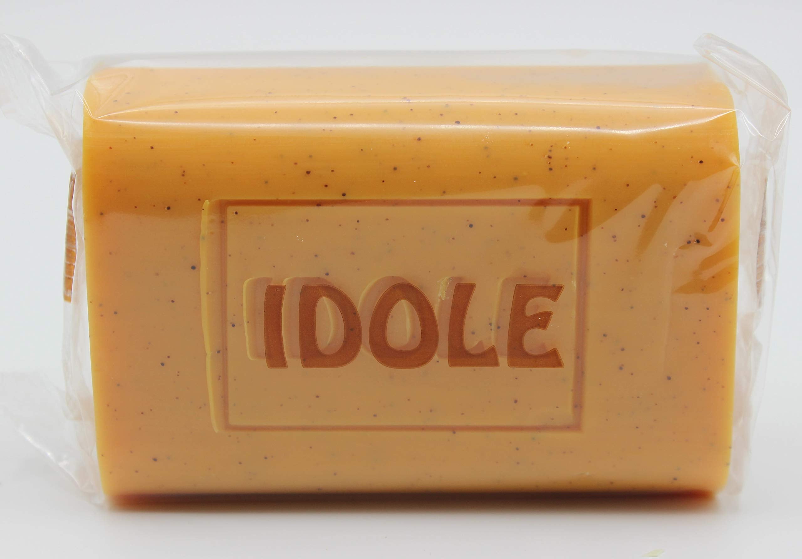 Idole Papaya Exfoliant Soap bar close-up showing texture for gentle exfoliation.