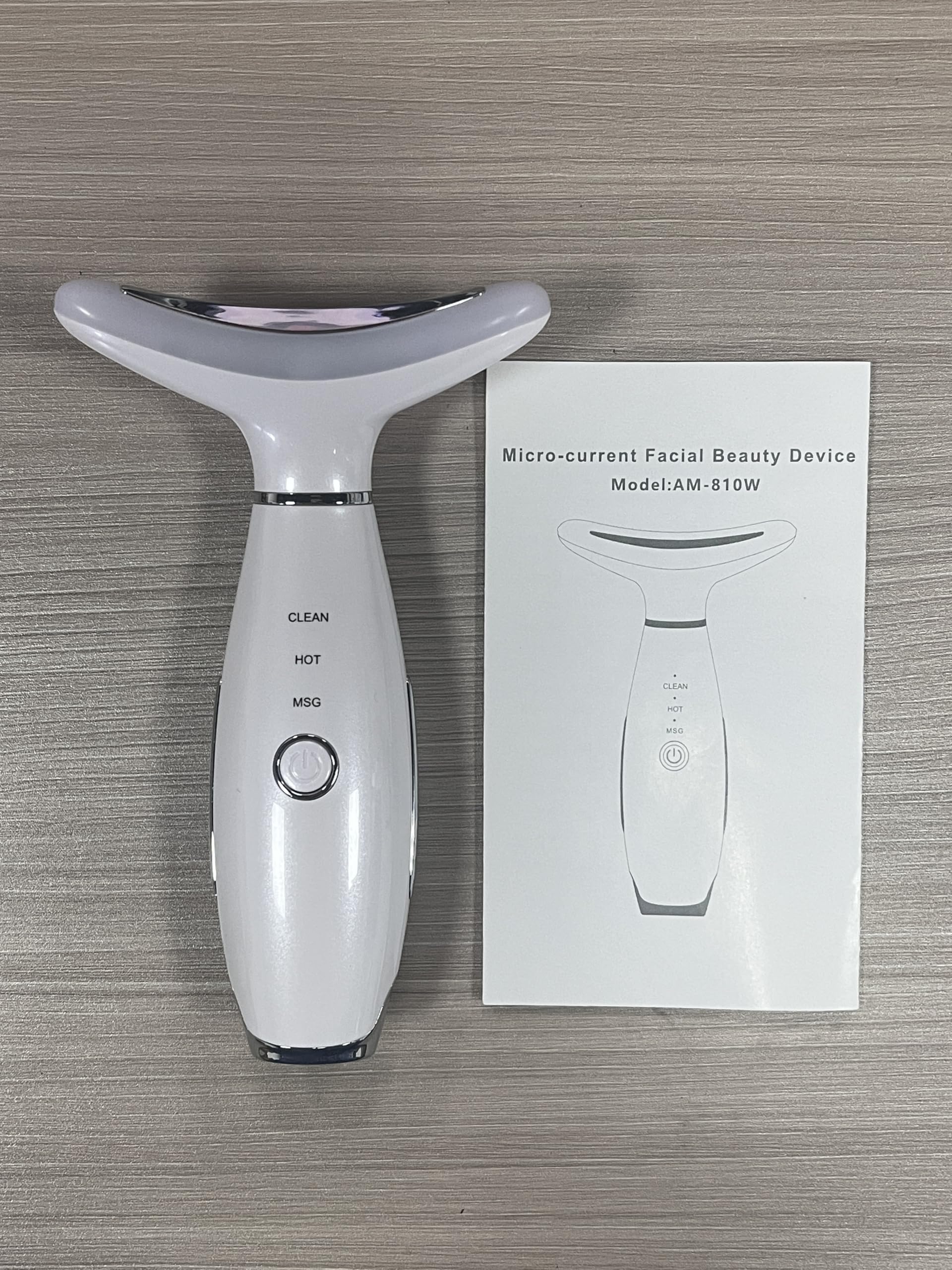 IHOWIN AM-810W package contents image lists massager, manual, cover, pedestal, USB cable.