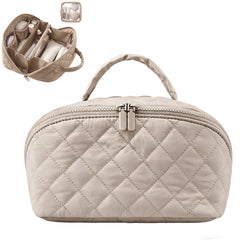 Ikokei travel makeup bag open flat for full visibility of contents.