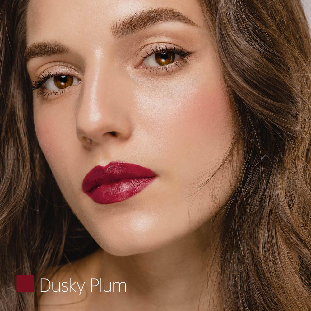 ilembane Plum Red lipstick application demonstrates creamy texture for even coverage