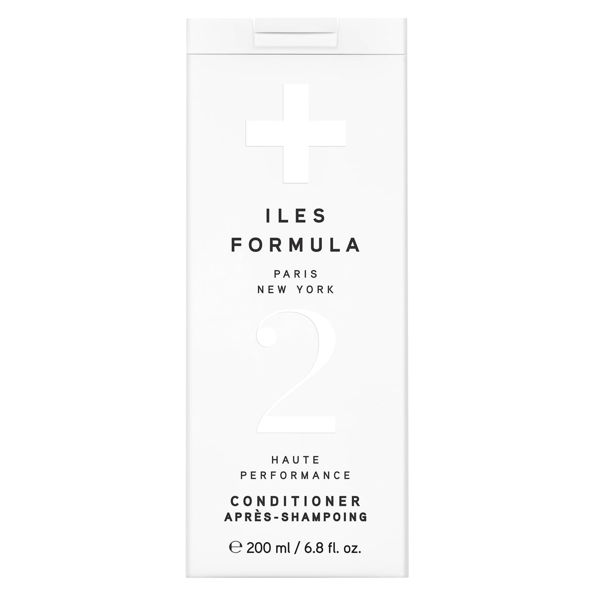 ILES FORMULA conditioner bottle pour demonstrates easy application and weightless moisture.