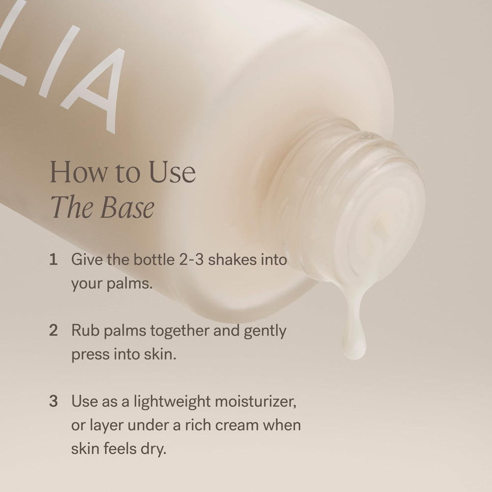 ILIA Base Face Milk Essence label highlights hyaluronic acid for lasting moisture.