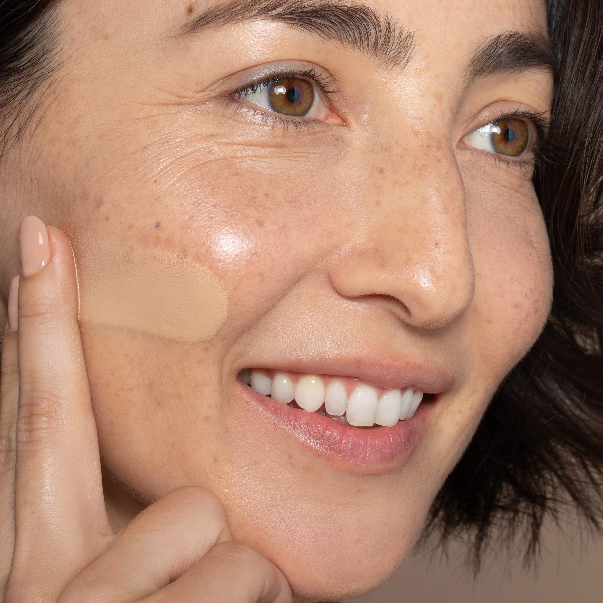 ILIA buildable coverage swirl showing customizable daytime to evening wear.