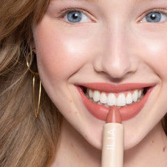 ILIA Color Block Lipstick Amberlight applied for smooth, comfortable lips.