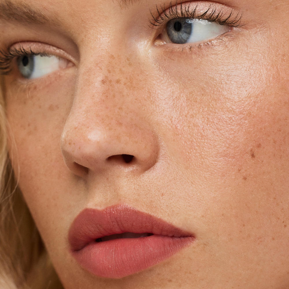 ILIA Lip Sketch Genre on lips with a hydrated soft-matte look.