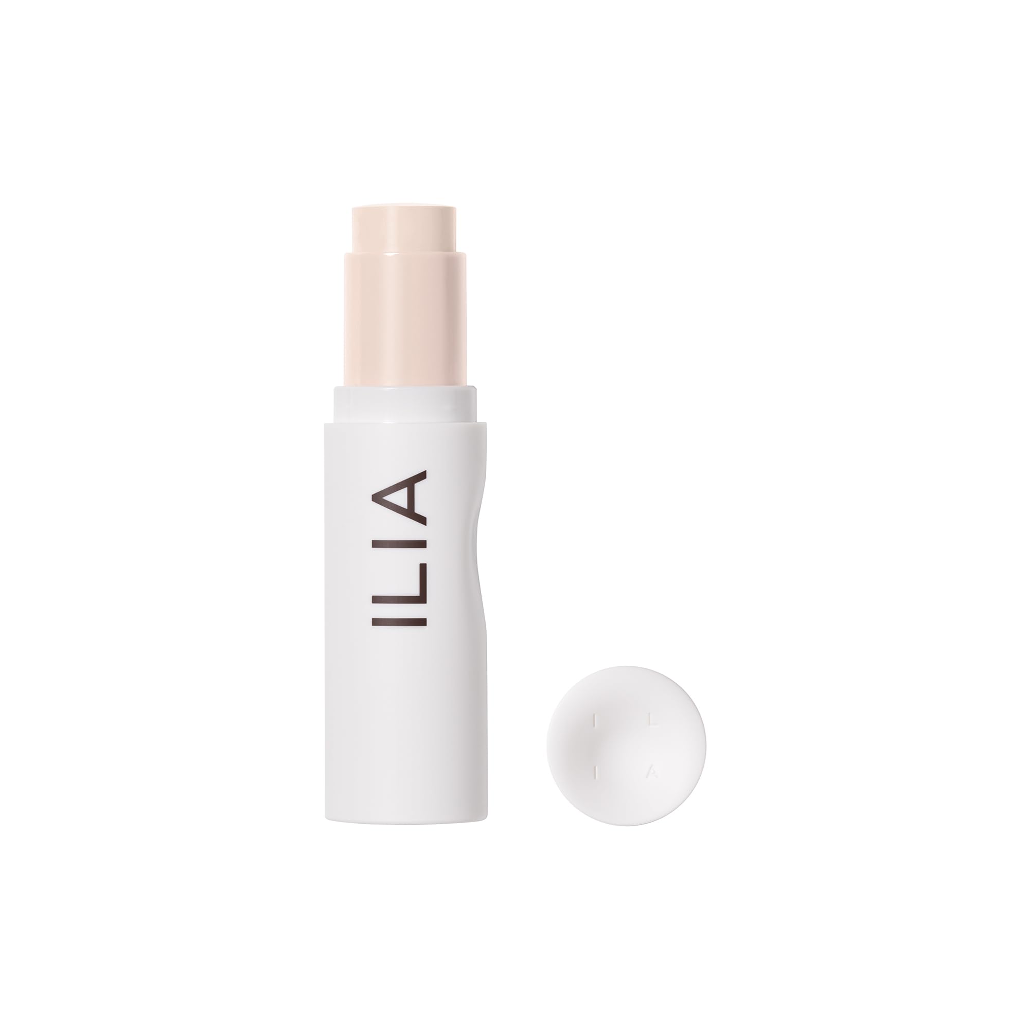 ILIA Skin Rewind Complexion Stick packaging close-up highlighting vegan, clean makeup credentials.