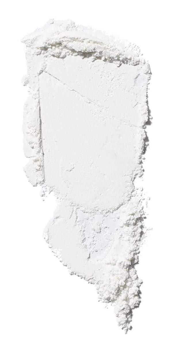 ILIA Soft Focus Setting Powder swatch reveals translucent blur on skin.
