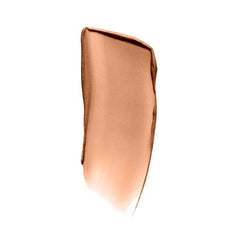 ILIA Sunshift Ray swirled on cheek for natural, blurring glow.