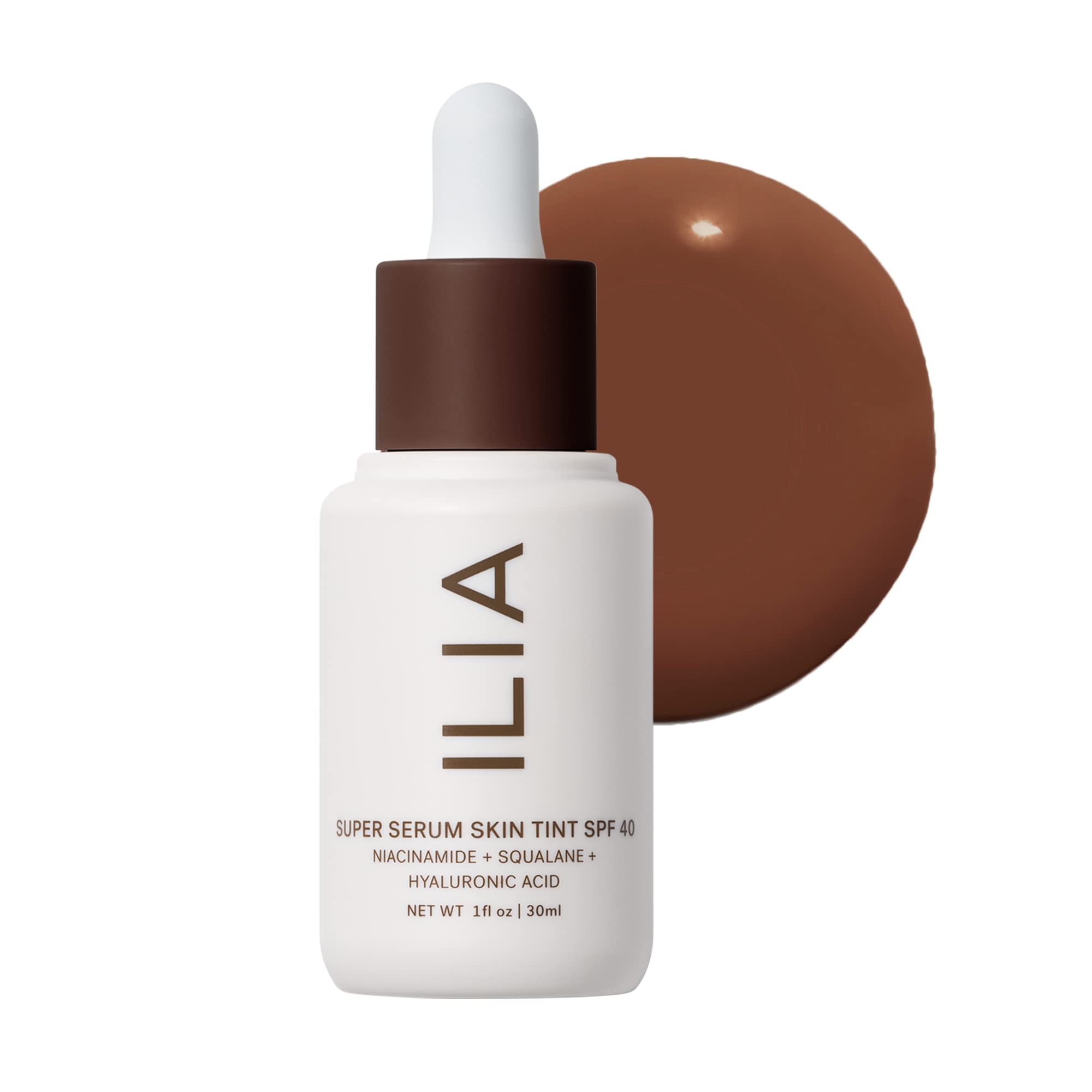 ILIA Super Serum Skin Tint bottle close-up showcasing dewy finish and SPF 40 protection.