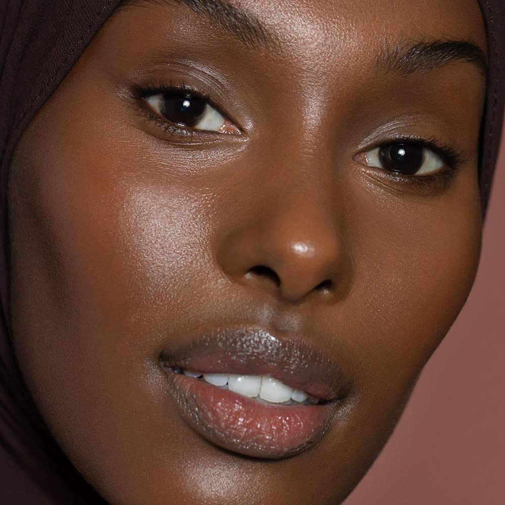 ILIA ingredients panel beside bottle highlighting hydrating formula