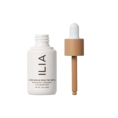 ILIA Super Serum Skin Tint swatch on skin displaying light coverage and glow