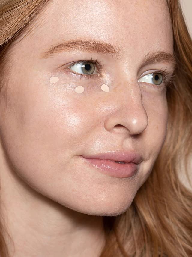 ILIA True Skin Serum Concealer close-up showing brightening effect.