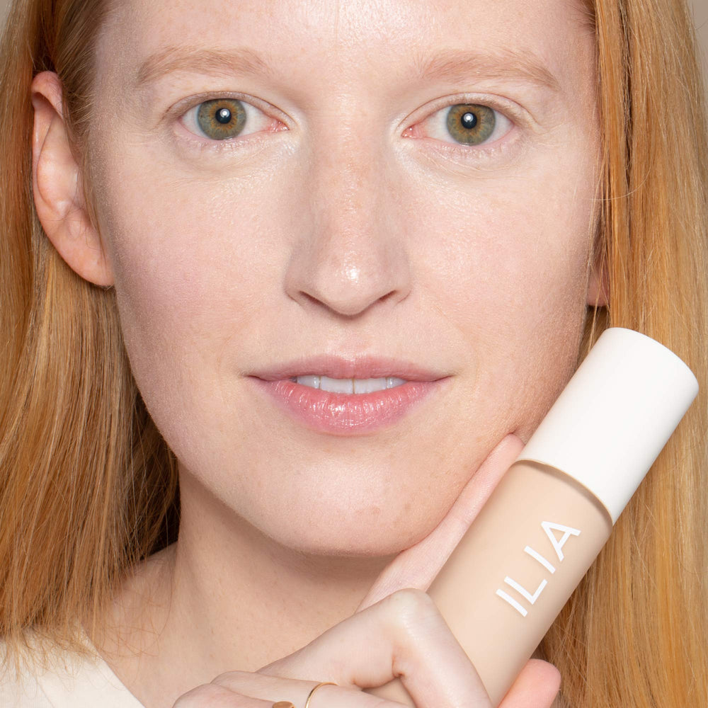 Applying ILIA True Skin Serum Foundation for a breathable finish