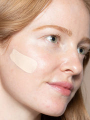Close-up of ILIA foundation on skin for smooth texture
