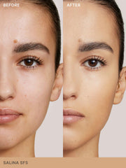 Dispense action of ILIA True Skin Serum Foundation on skin surface.