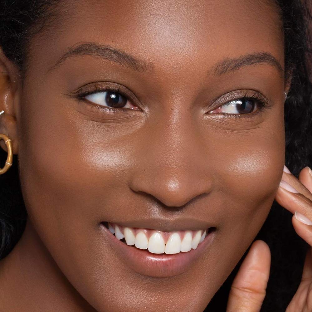 Close-up of natural finish on skin with ILIA True Skin Serum Foundation.