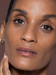 ILIA True Skin Serum Foundation swatches showing buildable coverage across tones.