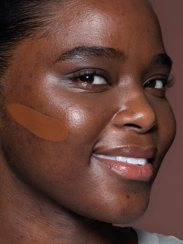 ILIA swatch on skin showing natural, skin-like finish with buildable medium coverage