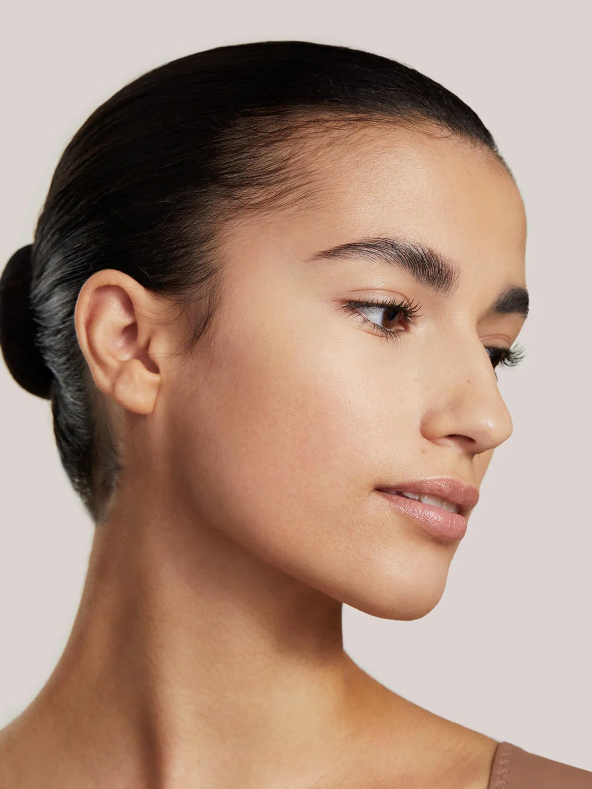 Swirl on skin with ILIA True Skin Serum Foundation for natural blend.
