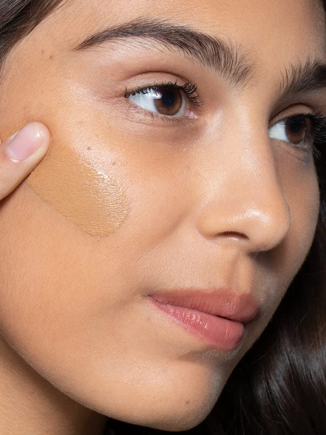 Swirl on skin with ILIA foundation showing seamless blend and skin-like texture
