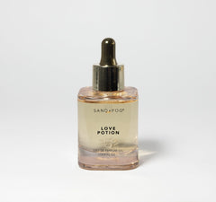 Sand + Fog Love Potion bottle close-up highlighting premium packaging and elegance