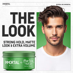 Immortal NYC Matte Look Hair Wax on fingers illustrating easy application and even distribution