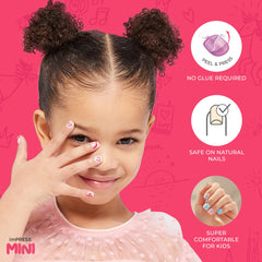 imPRESS KISS Dream Big pink nails worn on a child's hand for dress-up fun