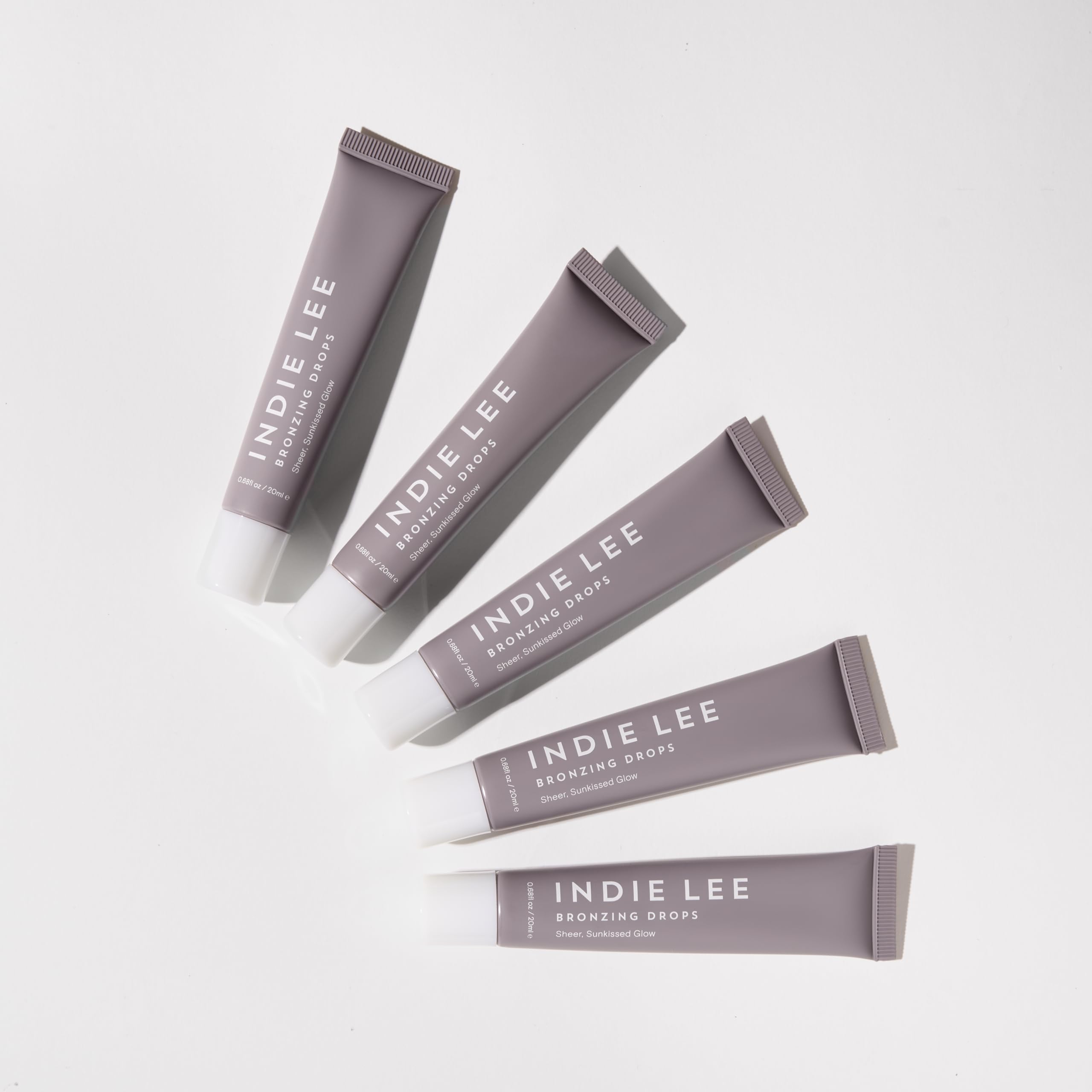Indie Lee Bronzing Drops: mix with primer or foundation for a custom glow.