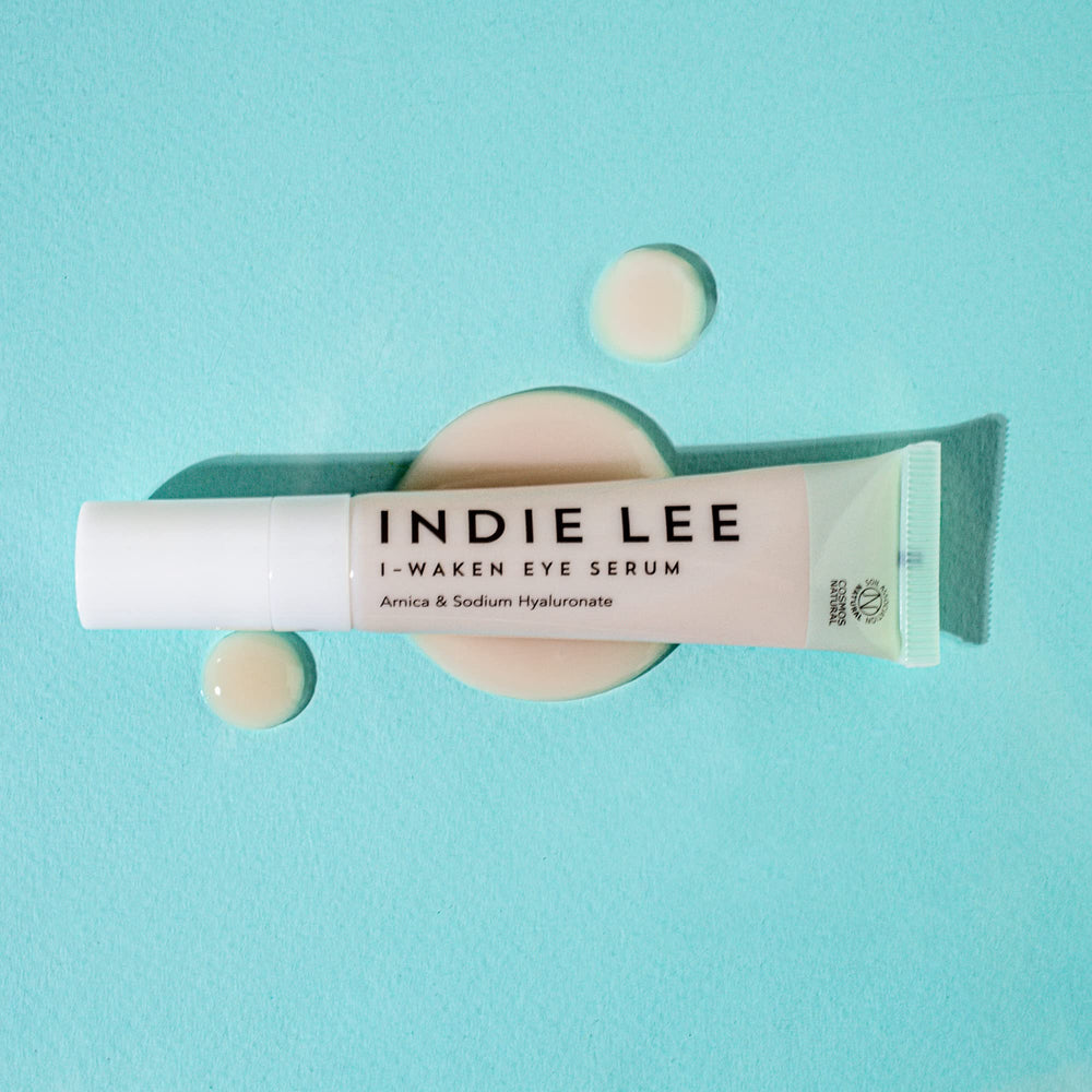 Indie Lee I-Waken applicator demonstrates cooling, soothing under-eye application