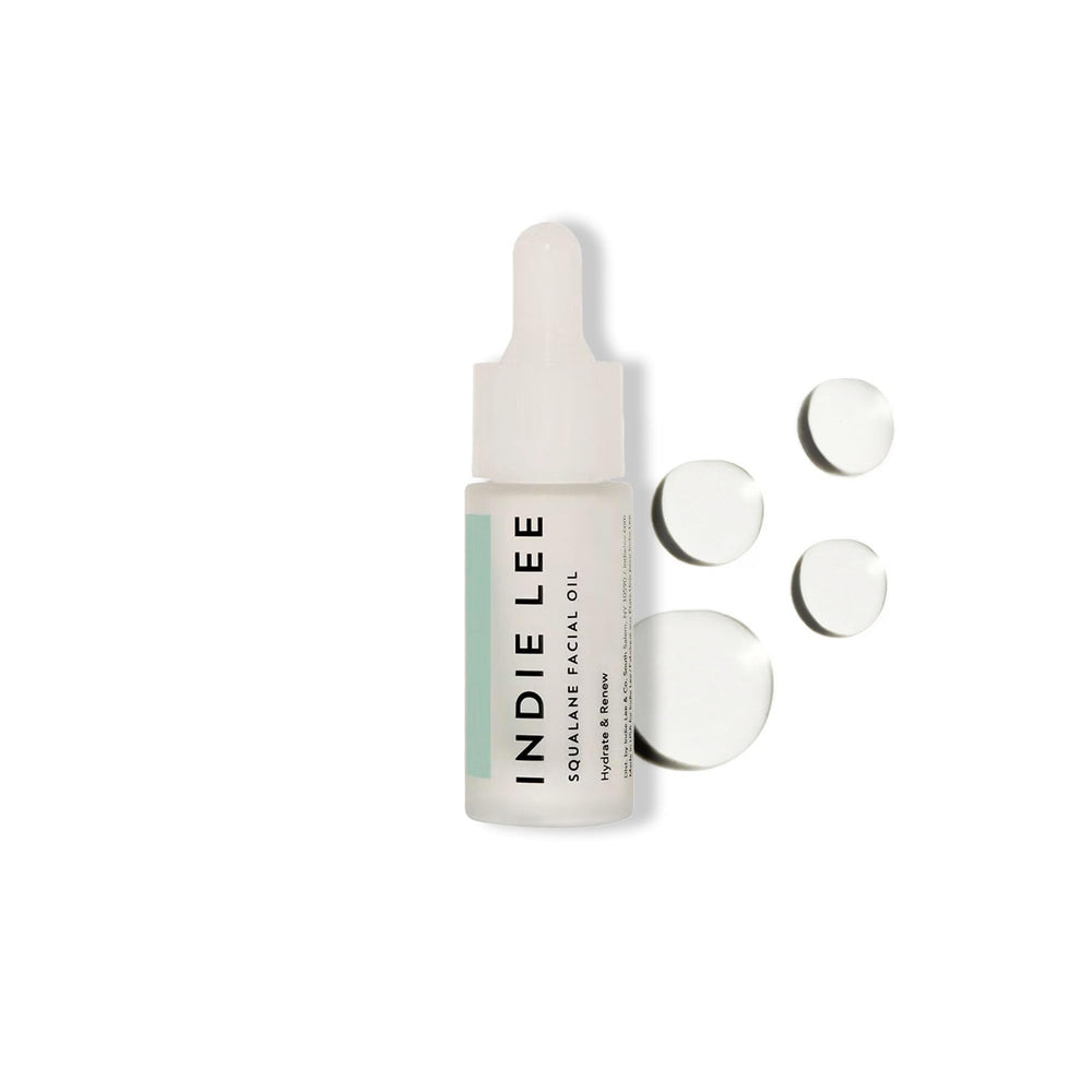 Indie Lee Squalane Oil bottle close-up showing lightweight hydration for daily use.