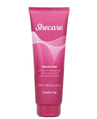 Inebrya Shecare Repair Mask jar with rich formula for damaged hair nourishment and shine.