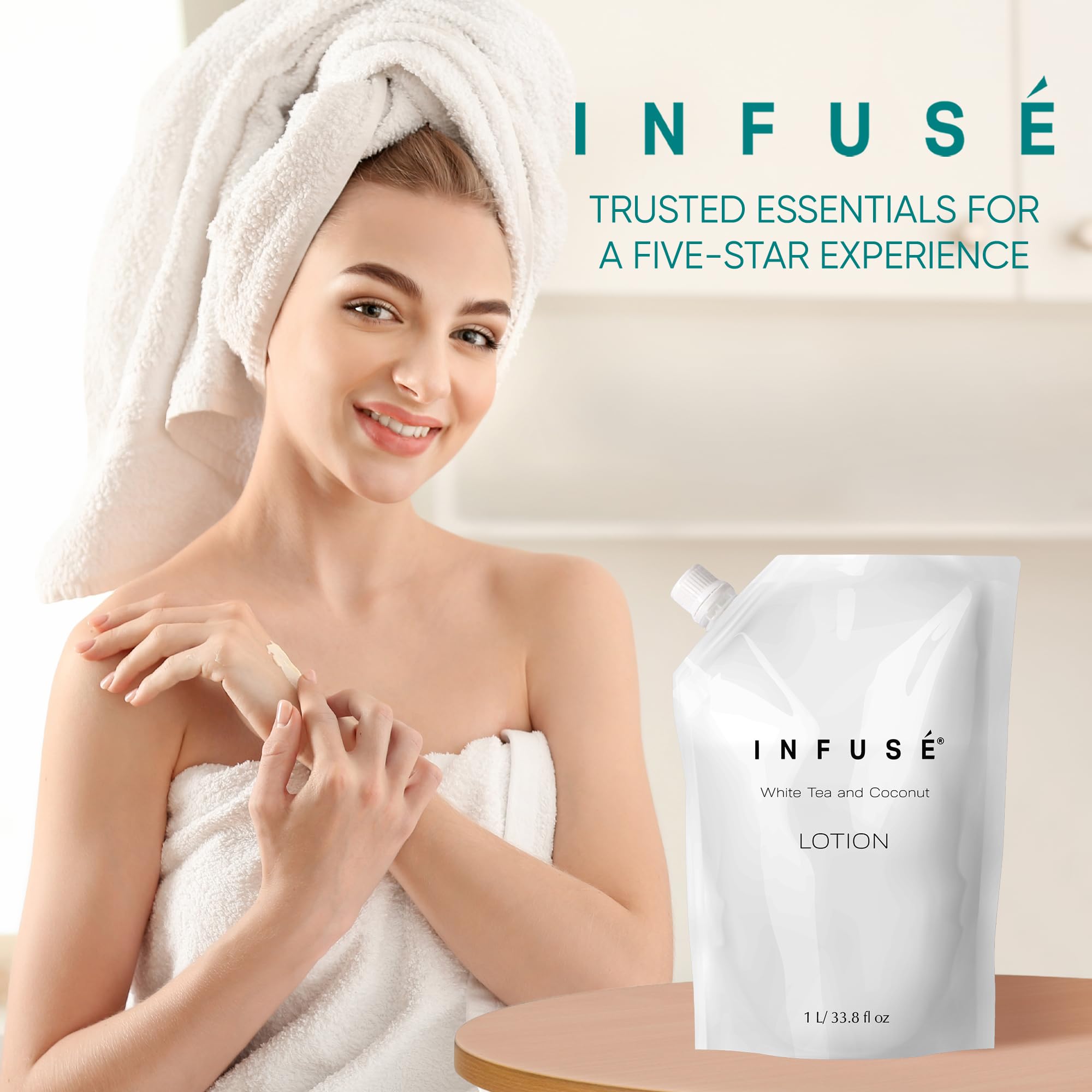 INFUSÉ luxury hotel bathroom with premium White Tea and Coconut amenities.