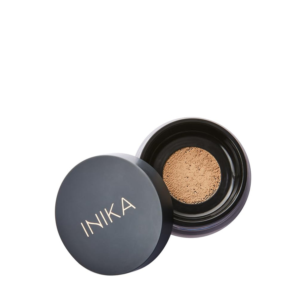 INIKA Organic Mineral Foundation bottle close-up showing sleek packaging and SPF 25 protection