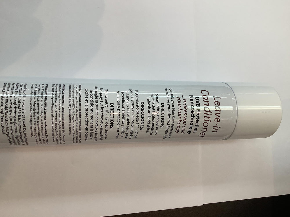 Inkursive Shuga Leave-In Conditioner label close-up highlighting smooth, frizz-control formula.