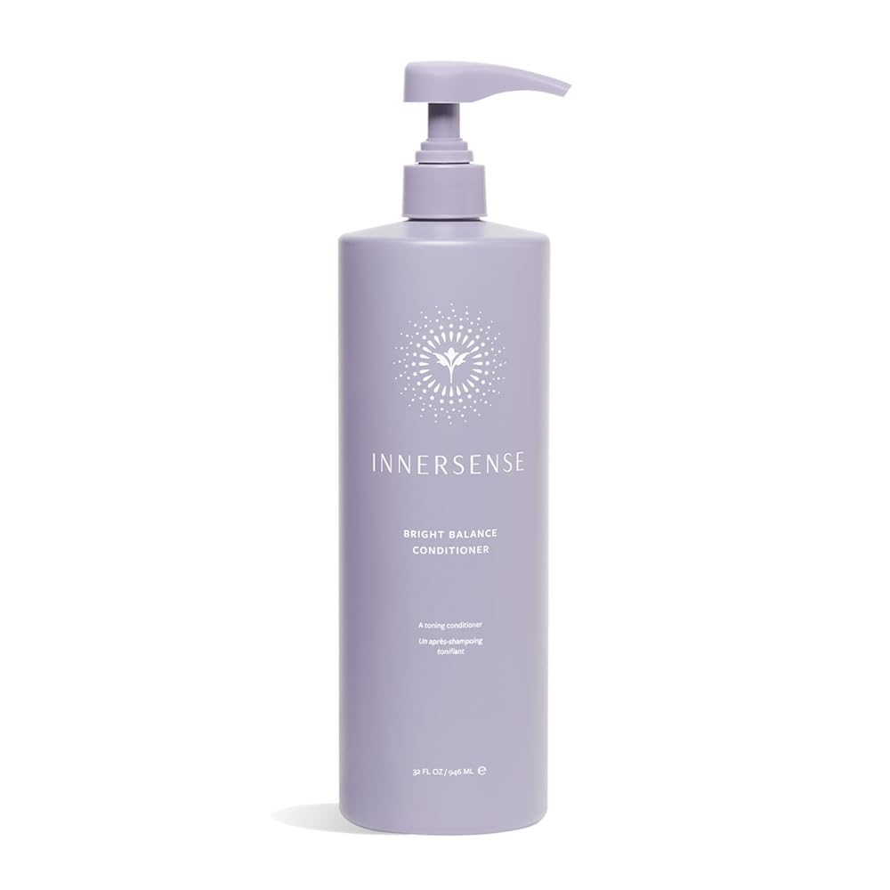 INNERSENSE Bright Balance Purple Toning Conditioner bottle neutralizes brass and cools tones.