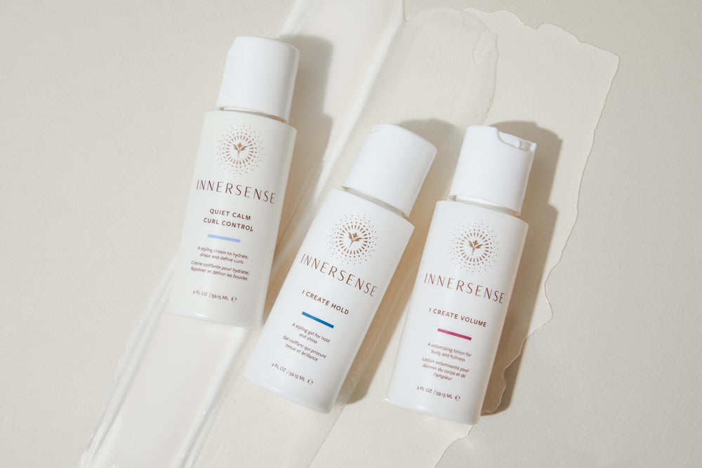 INNERSENSE Quiet Calm Curl Control Cream swirls through curls for smooth control