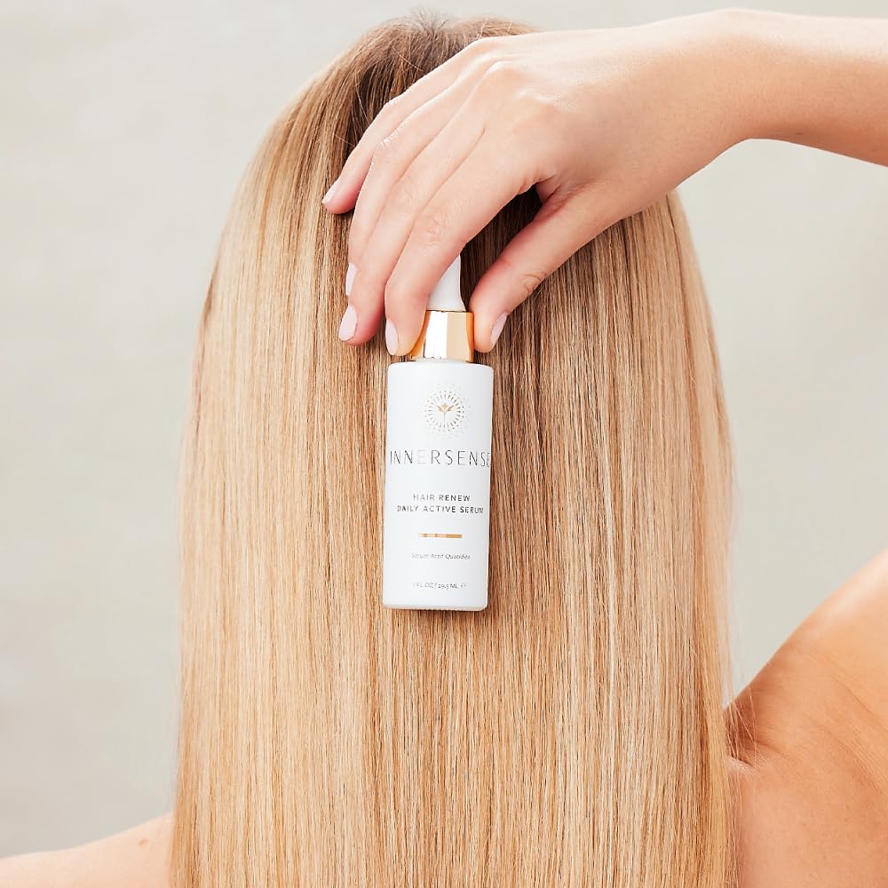 INNERSENSE Hair Renew bottle closeup emphasizes clean, vegan, cruelty-free care.