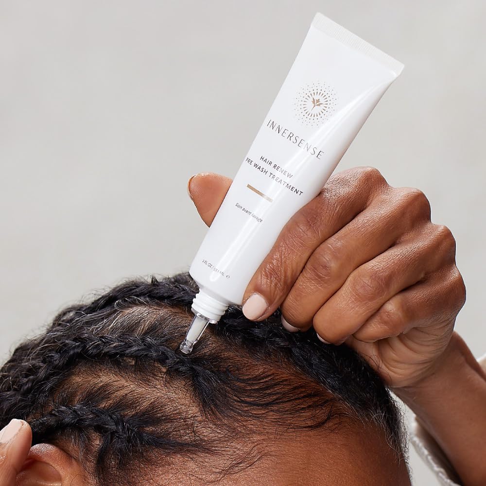 INNERSENSE Hair Renew Pre-Wash Treatment being applied to dry scalp for exfoliation.