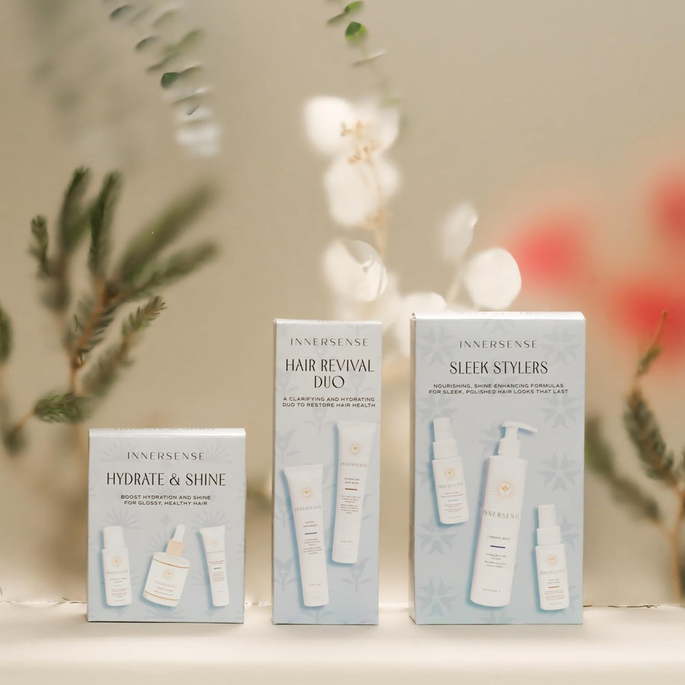Clean packaging display of INNERSENSE Hydrate & Shine Set with natural ingredients emphasis.